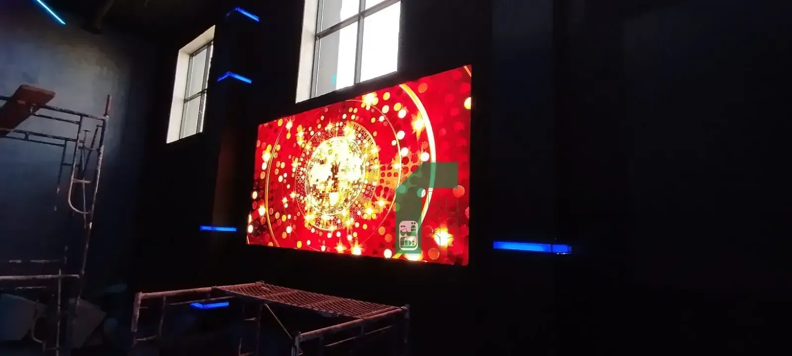 Ruqaqa large indoor flat LED screen, wall-mounted, displaying vivid, ultra-sharp content